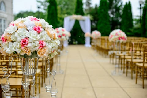A flower-lined wedding aisle