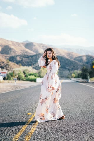 A woman in a floral dress