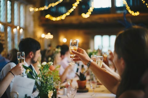 Guests raising glasses