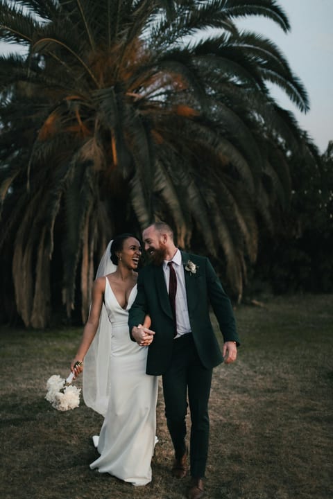 A couple among palm trees